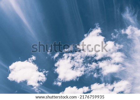 Blue sky with cumulonimbus and cirrus clouds as background
