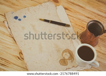 Background of a cup of coffee on an old paper