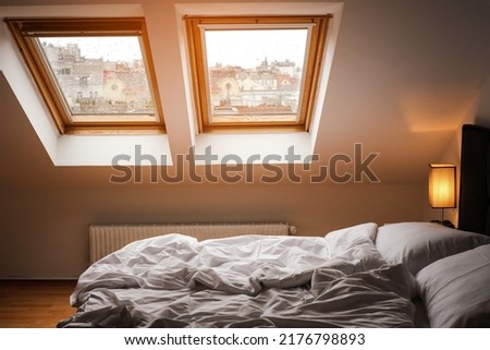 bedroom interior in scandinavian style with skylights Royalty-Free Stock Photo #2176798893