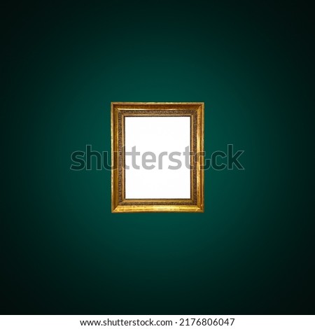 Antique art fair gallery frame on royal green wall at auction house or museum exhibition, blank template with empty white copyspace for mockup design, artwork concept Royalty-Free Stock Photo #2176806047