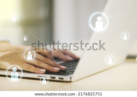 Social network media concept with hands typing on computer keyboard on background. Double exposure