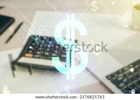 Virtual USD symbols illustration on calculator and laptop background. Trading and currency concept. Multiexposure