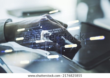 Multi exposure of abstract software development hologram and finger presses on a digital tablet on background, research and analytics concept