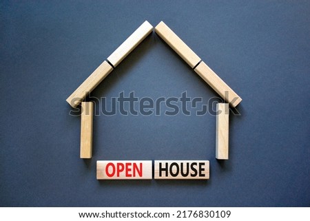 Open house symbol. Concept words 'Open house' on wooden blocks near miniature house. Beautiful grey background, copy space. Business and open house concept.
