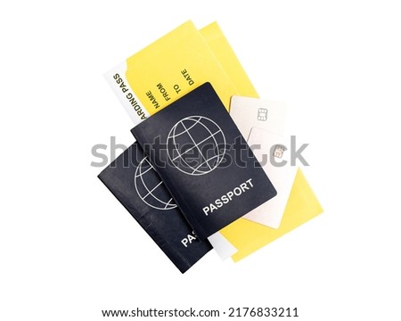 Two passports, boarding passes and credit cards isolated on white background. Air travel by couple or family trip. Tourism concept. High quality photo