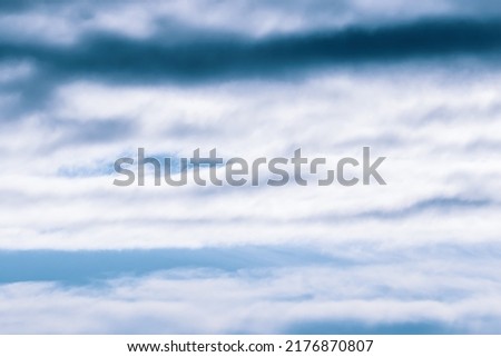 Abstract background of blue cloudy urban sky in the morning. Peace and tranqulity concept
