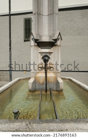 A picture of water pond and water fountain at Zurich public area 