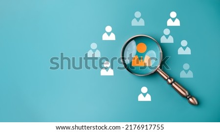 HRM or  Human Resource Management, Magnifier glass focus to manager icon which is among staff icons for human development recruitment leadership and customer target group concept. Royalty-Free Stock Photo #2176917755