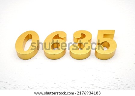   Number 0635 is made of gold painted teak, 1 cm thick, laid on a white painted aerated brick floor, visualized in 3D.                                