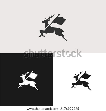 Deer silhouette holding flag logo vector