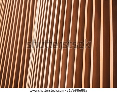 Wooden wall panel line pattern brown color texture Royalty-Free Stock Photo #2176986885