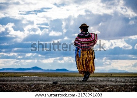 Traditionally clothed indigenous Quechua woman in Bolivia. Royalty-Free Stock Photo #2176991603