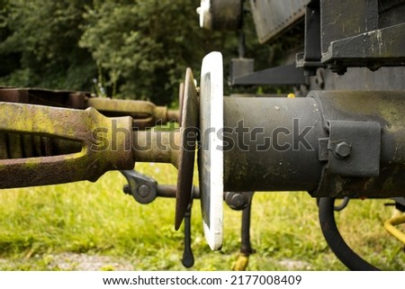 Detail of the coupling between the train locomotive and the following wagon. Technical train equipment. Connecting rolling stock.