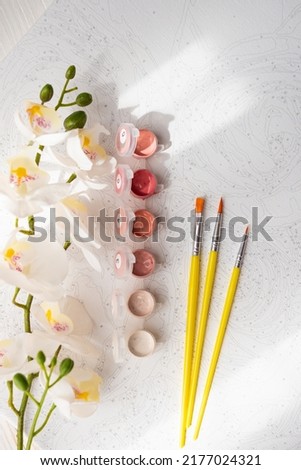 A set of colorful gouache for painting by numbers, pastel colors, drawing on canvas. Concepts of leisure activity, hobby and relax. Selective focus. Close up. Royalty-Free Stock Photo #2177024321