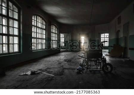 Inside old Orlovka Asylum for the insane in Voronezh Region. Dark creepy abandoned mental hospital. Royalty-Free Stock Photo #2177085363