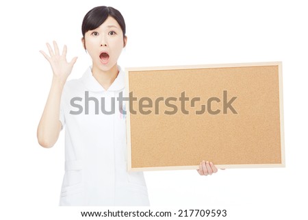 surprised Japanese nurse with Bulletin Board