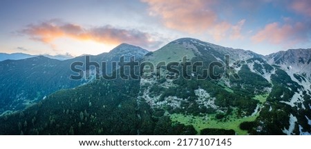 Nice aerial view of Pirin mountain, Bulgaria. Amazing nature showing mountain's peaks with dramatic sky above them. Royalty-Free Stock Photo #2177107145
