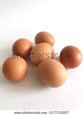 Six eggs on white background