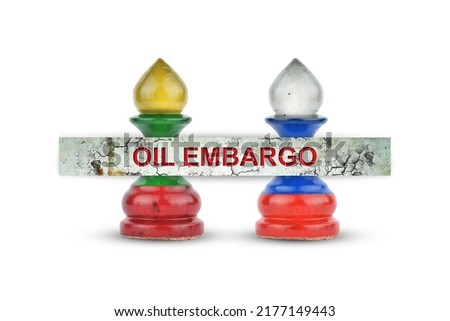Oil embargo. Pawns in the colors of the flags of Lithuania and Russia. Isolated on white background. Rejection of Russian oil. Sanctions. Politics. Economy. Background.