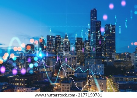 Illuminated aerial cityscape of Seattle, downtown at night time, Washington, USA. Forex graph hologram. The concept of internet trading, brokerage and fundamental analysis