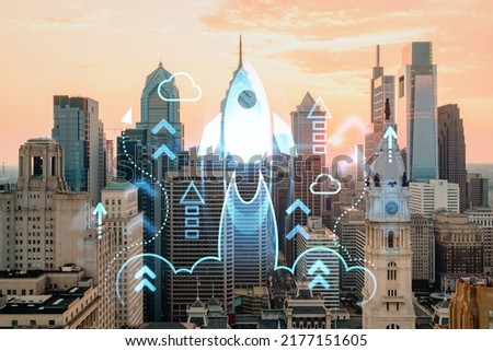 Aerial panoramic skyline of Philadelphia financial downtown, Pennsylvania, USA. City Hall Clock Tower at sunset. Startup company, launch project to seek and develop scalable business model, hologram