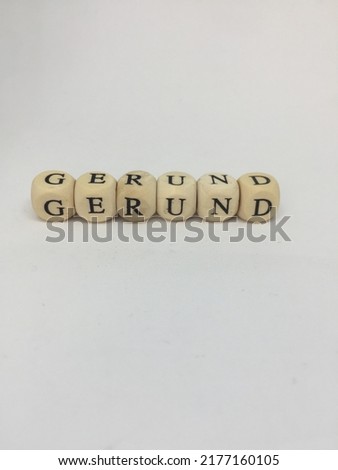 Gerund - wooden cubes with letters