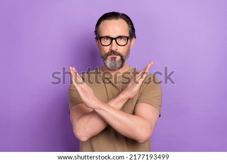 Photo of cool confident man cross hands asking you to stop enough bullying isolated on violet color background Royalty-Free Stock Photo #2177193499