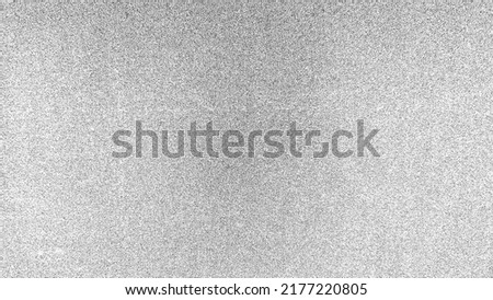 Black and White Noise. Silver Paper Texture. Abstract Noisy Background. Gray Backdrop. Noise Overlay. Royalty-Free Stock Photo #2177220805