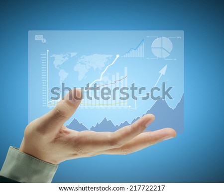 Businessman pressing high tech type of modern buttons on a virtual background 