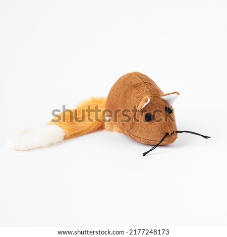  brown plush toy mouse for cats photo on a white background. for advertising and banners