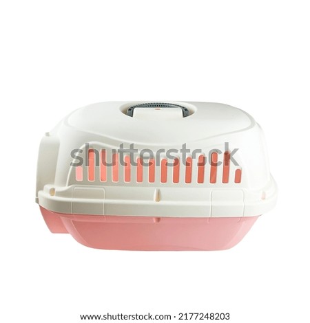 pink pet carrier. traveling with animals photo on a white background. for advertising and banners