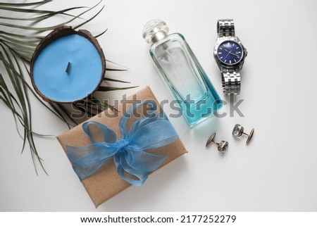 Happy father's day greeting card . set of men's accessories. men's tie, watches, cufflinks and cologne. gift concept