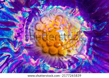 Colorful oil and water psychedelic abstract tie dye design on glass. Royalty-Free Stock Photo #2177265839