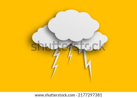 clouds and lightning Isolated paper on yellow background. Cut paper.
