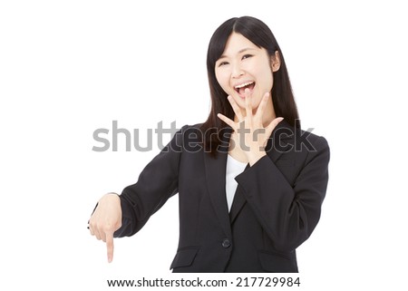 surprised businesswoman pointing down