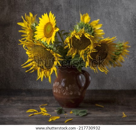Still life with sunflowers on the table