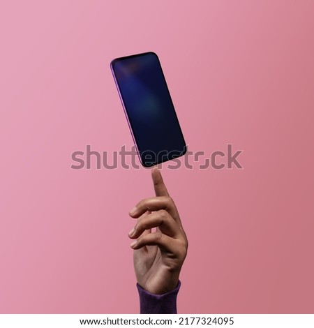 Mobile Phone Mockup Image. Screen as Empty. Hand levitating a Blank Display Smartphone. Clean and Minimal Styles Royalty-Free Stock Photo #2177324095