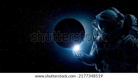 Astronaut at spacewalk . Mixed media Royalty-Free Stock Photo #2177348519