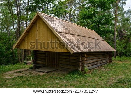 Wood house in the forest .Old wooden house middle of forest.old wooden house in the forest, digital photo picture as a background .
