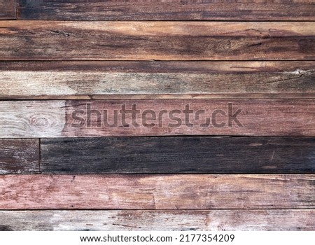 Old brown color wood wall for seamless wood background and texture.
