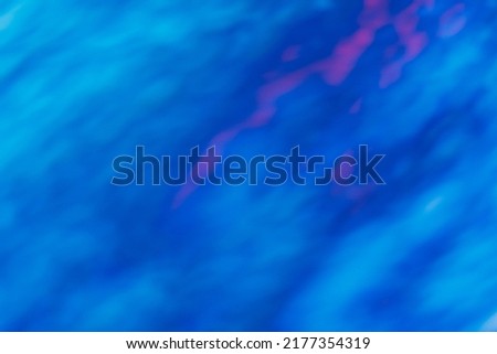 Blur glow overlay. Neon light leak. Sci-Fi radiance. Defocused luminous navy blue pink color gradient flare creative abstract art background.