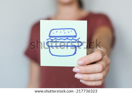 Picture icon in the hands of sandwich
