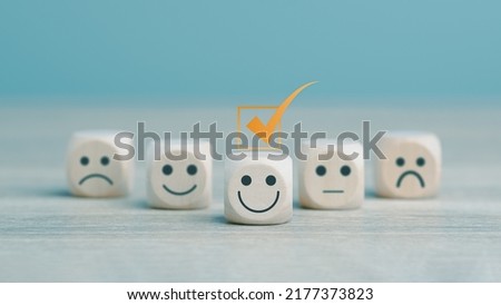 The wooden blocks are placed on the table, and customer service best excellent business rating experience. Satisfaction survey concept.Shopping service on The online web and offers home delivery. Royalty-Free Stock Photo #2177373823