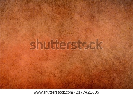Textured orange colored background, empty copy space for text, scratched wall structure, templete for scrapbook, vintage style 