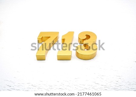     Number 713 is made of gold painted teak, 1 cm thick, laid on a white painted aerated brick floor, visualized in 3D.                                 