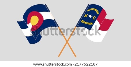 Crossed flags of The State of Colorado and The State of North Carolina. Official colors. Correct proportion. Vector illustration
