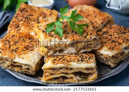 Traditional delicious Turkish cuisine, Turkish food; handmade mince pie, Turkish name; Kayseri Tandir boregi, Tandir boregi Royalty-Free Stock Photo #2177533663