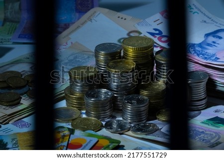 Bank vault with cash. Coins, banknotes, bank cards.