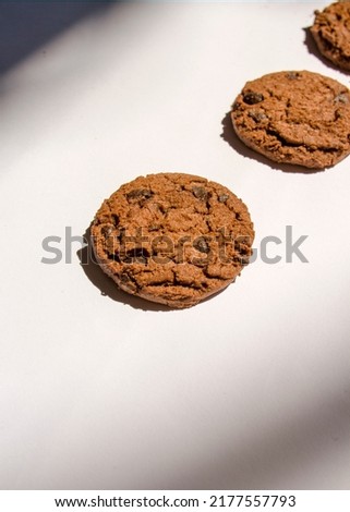 Delicious looking chocolate cookies on a white  background - food photography - stock photo