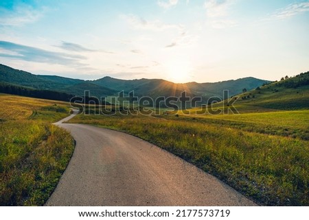 Summer country road with trees beside. Rural up hill, vintage, environment road. Nature road. Asphalt road. Royalty-Free Stock Photo #2177573719